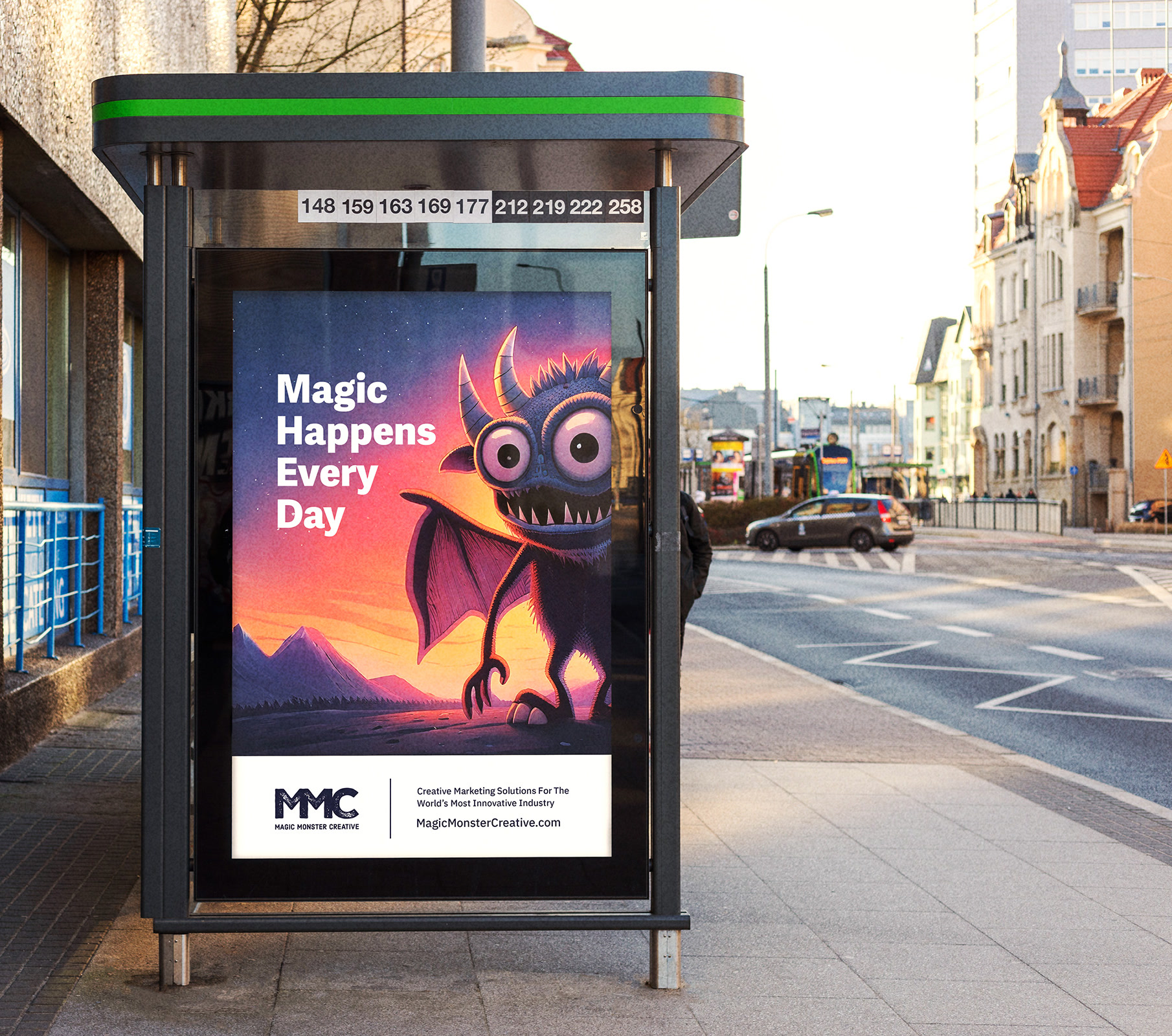 A city bus shelter poster: Magic Happens Every Day beside a grinning winged monster, with the MMC lockup below.
